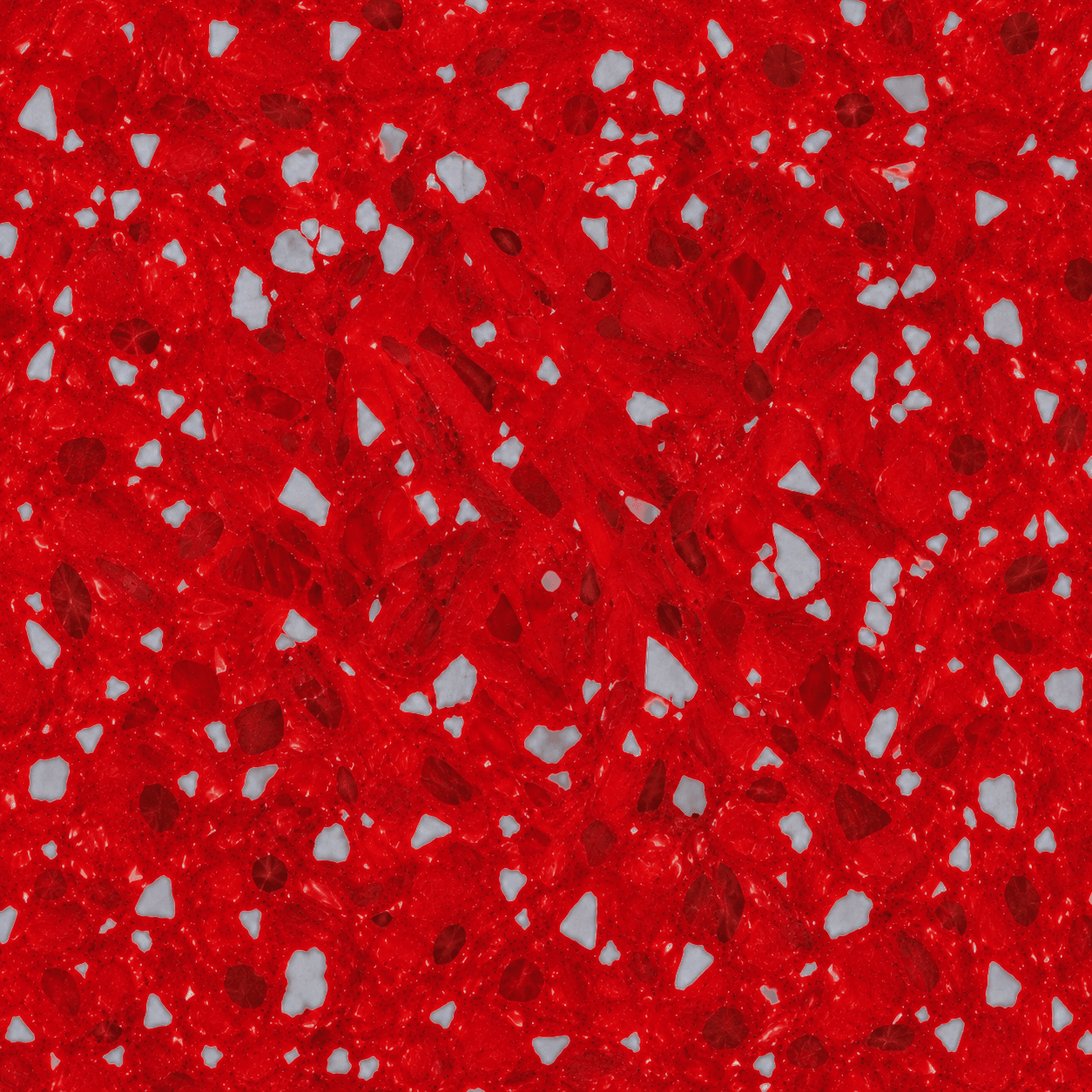 Close-up of red recycled plastic with white flecks