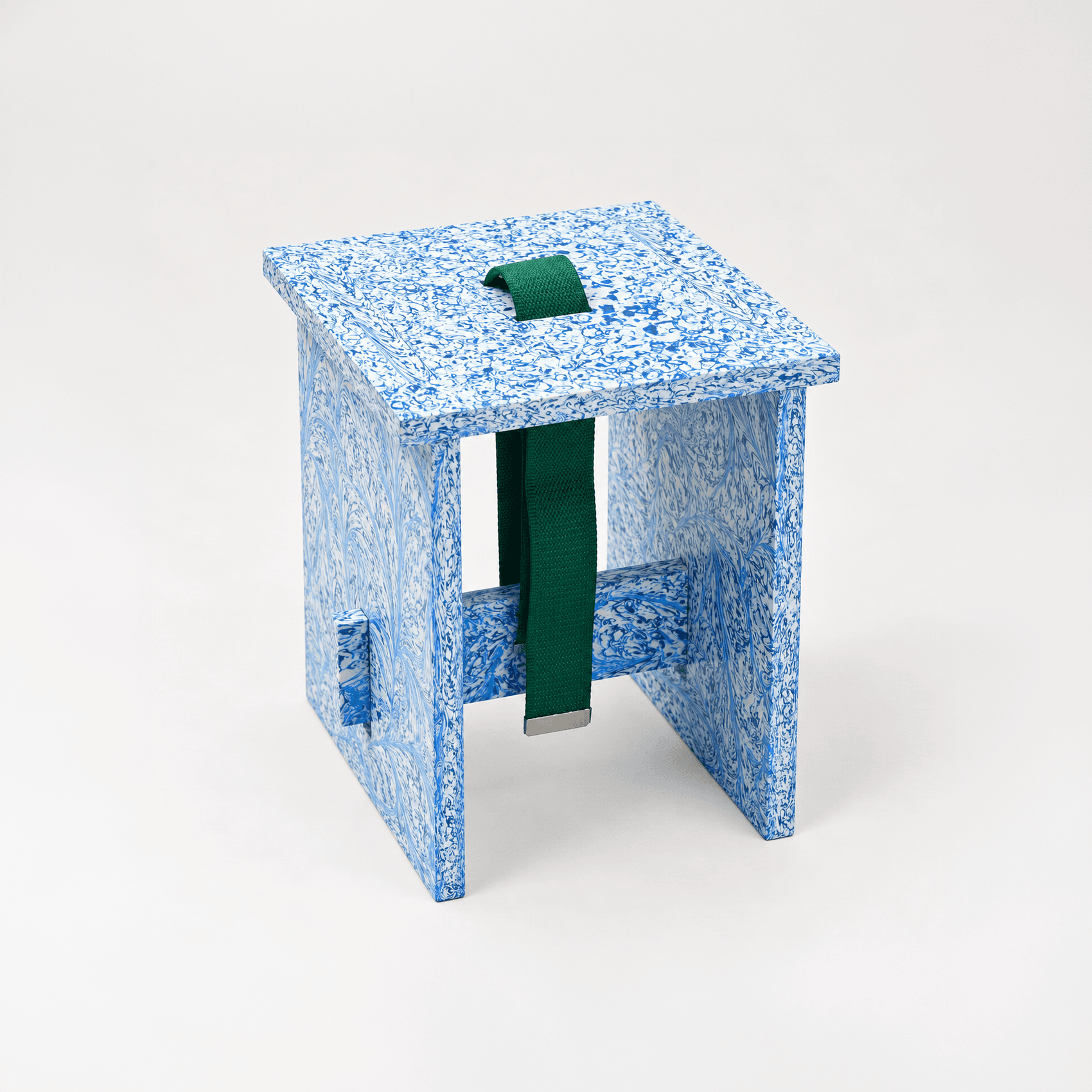 Speckled blue recycled-plastic stool with a green strap handle