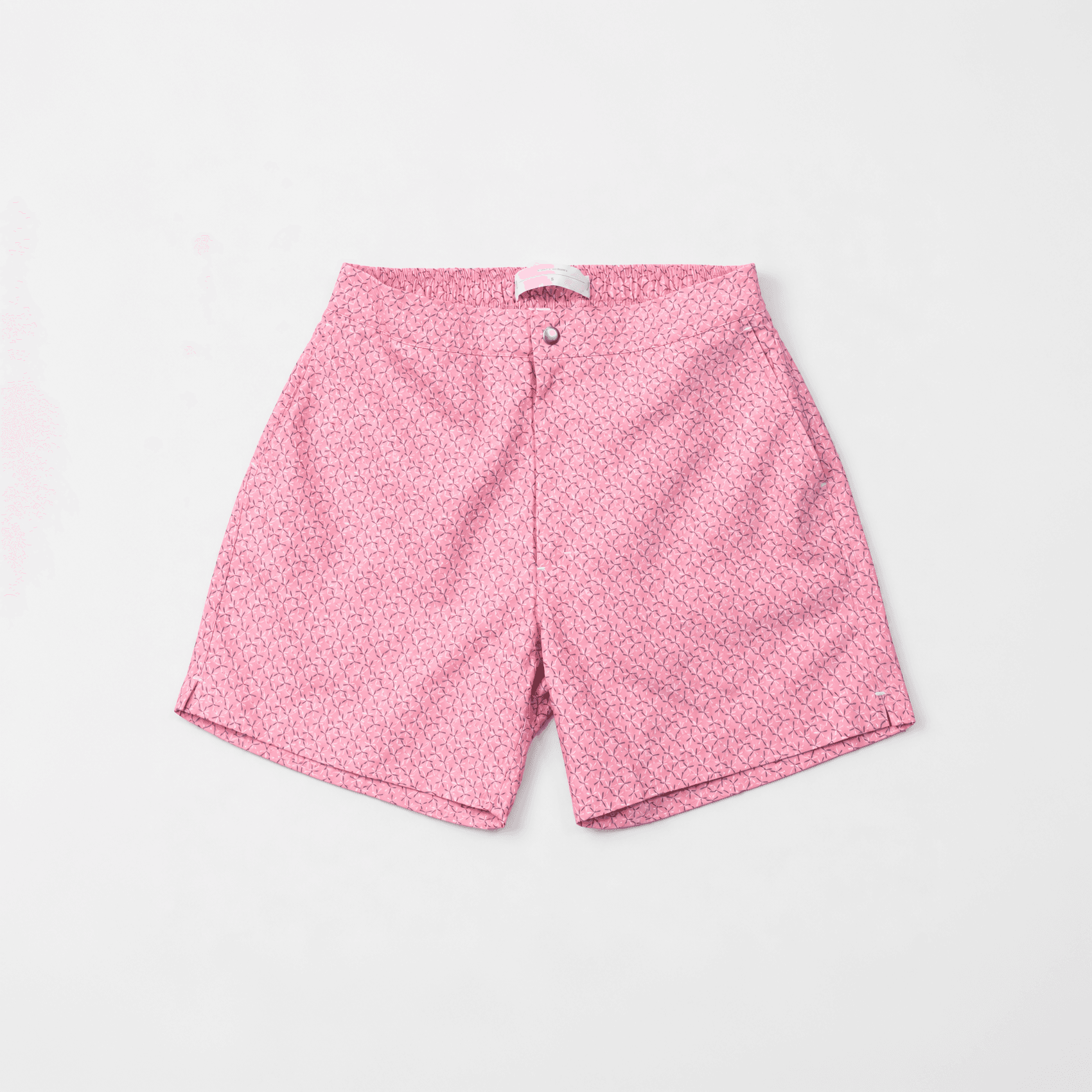 Coral swim shorts with a fine Garden City print