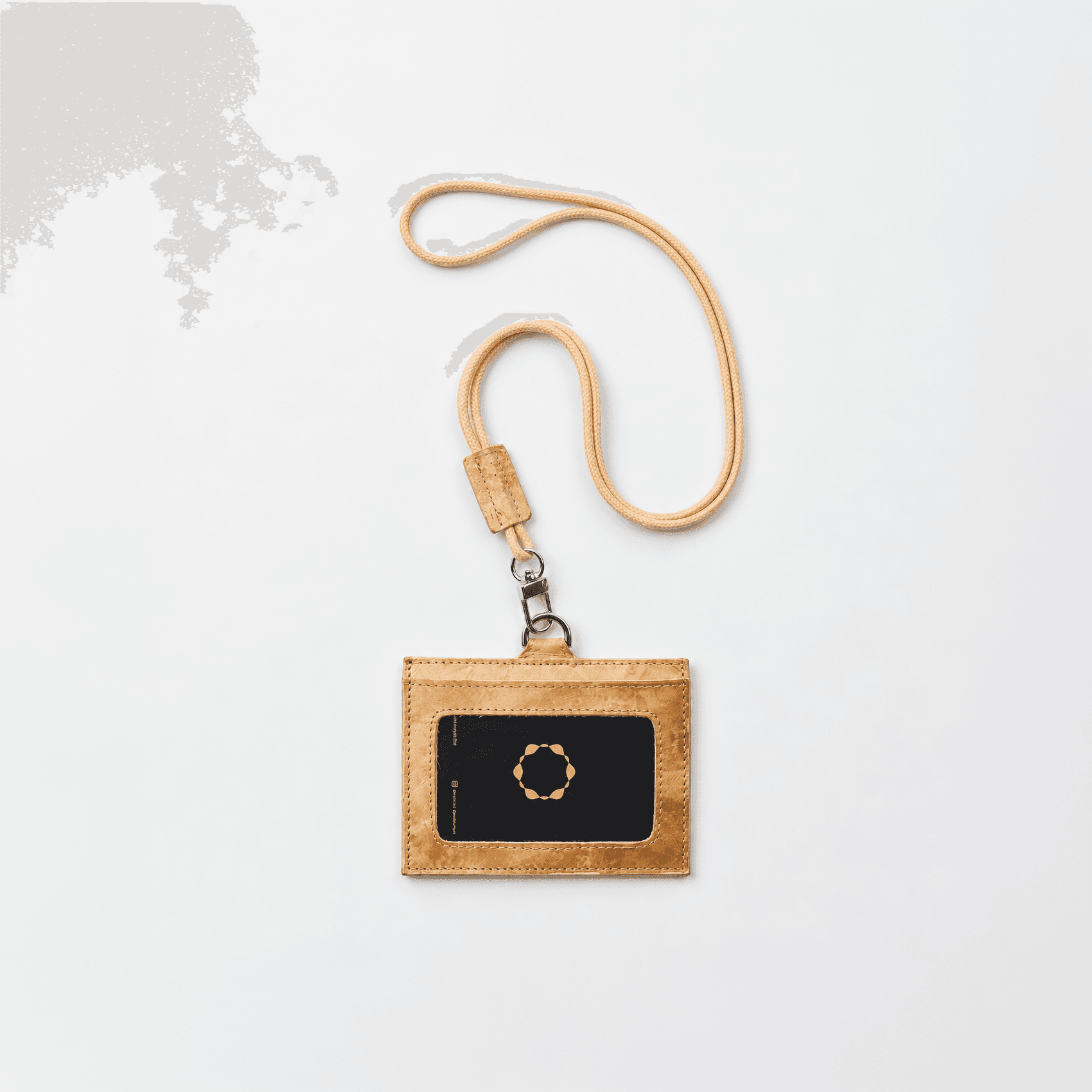 Mycelium ID card holder on a cord lanyard, card window side